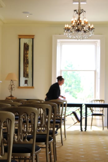 Transforming the lounge into a ceremony room is among the first jobs of the day