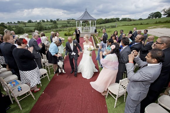 Couple getting married outside at shottle hall