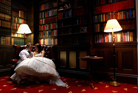 Bride and groom in shottle hall library