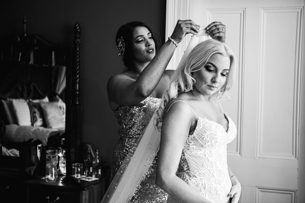 Bride getting ready in room