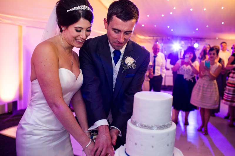 cutting-of-the-cake-in-a-marquee.jpg